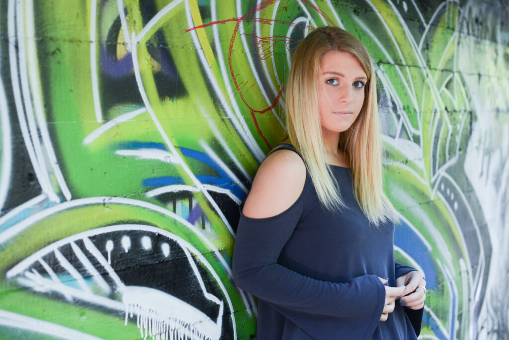high school senior photo girl at village at grand traverse commons in traverse city michigan