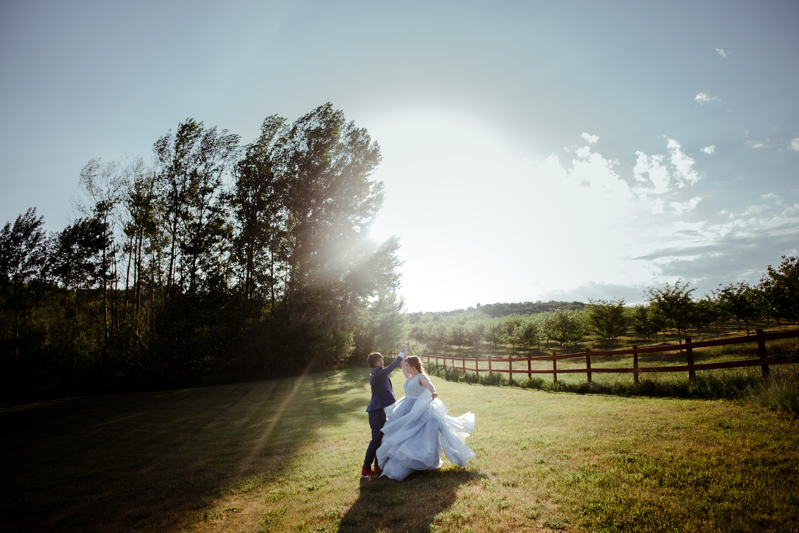bride and groom dancing at wedding in a field in traverse city michigan