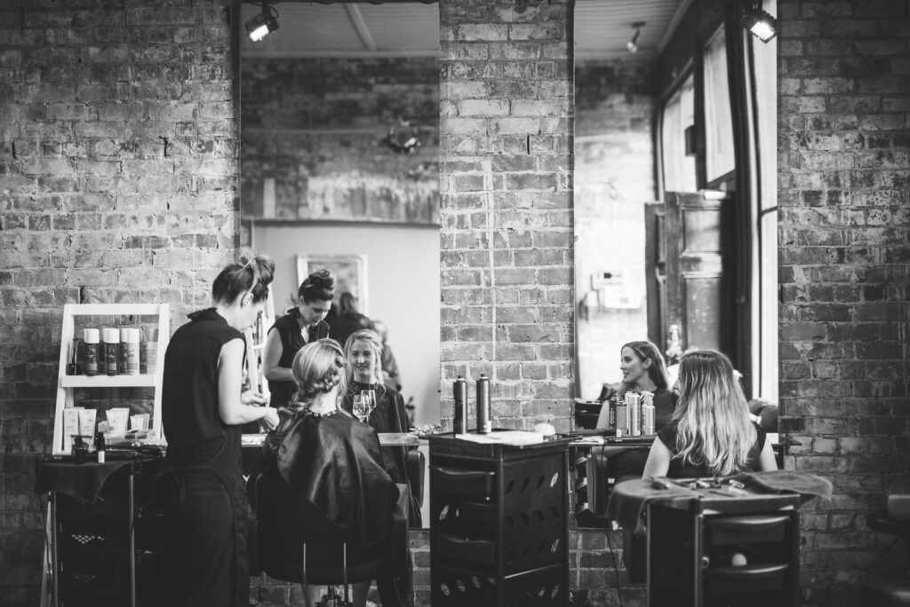 bride getting ready at salon before destination wedding