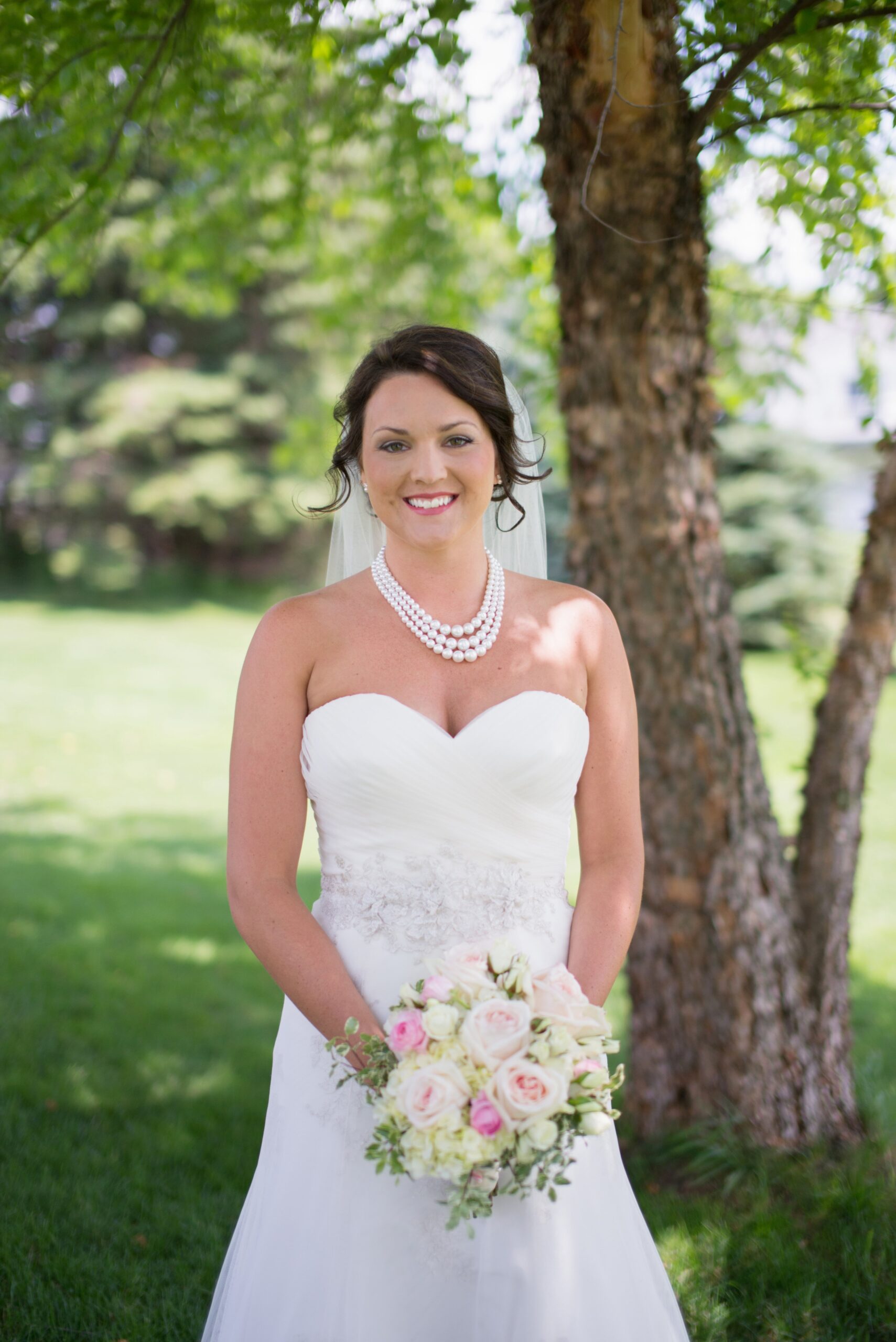 fineart portrait of bride posing outside in traverse city michigan