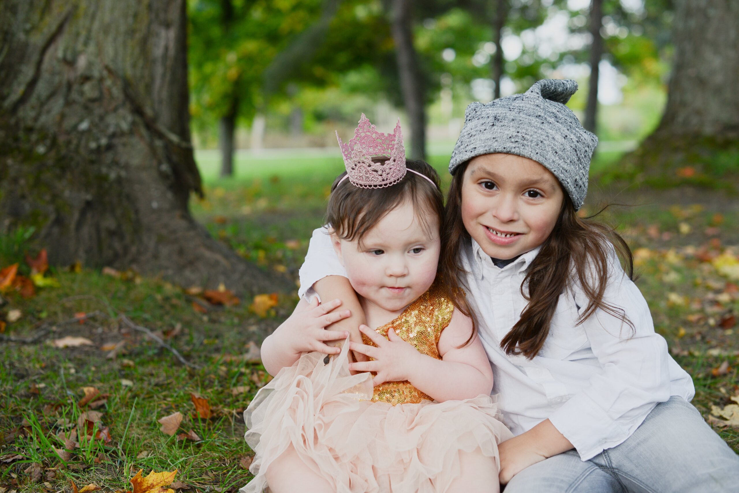 little boy and girl posing for family photos in traverse city northern michigan