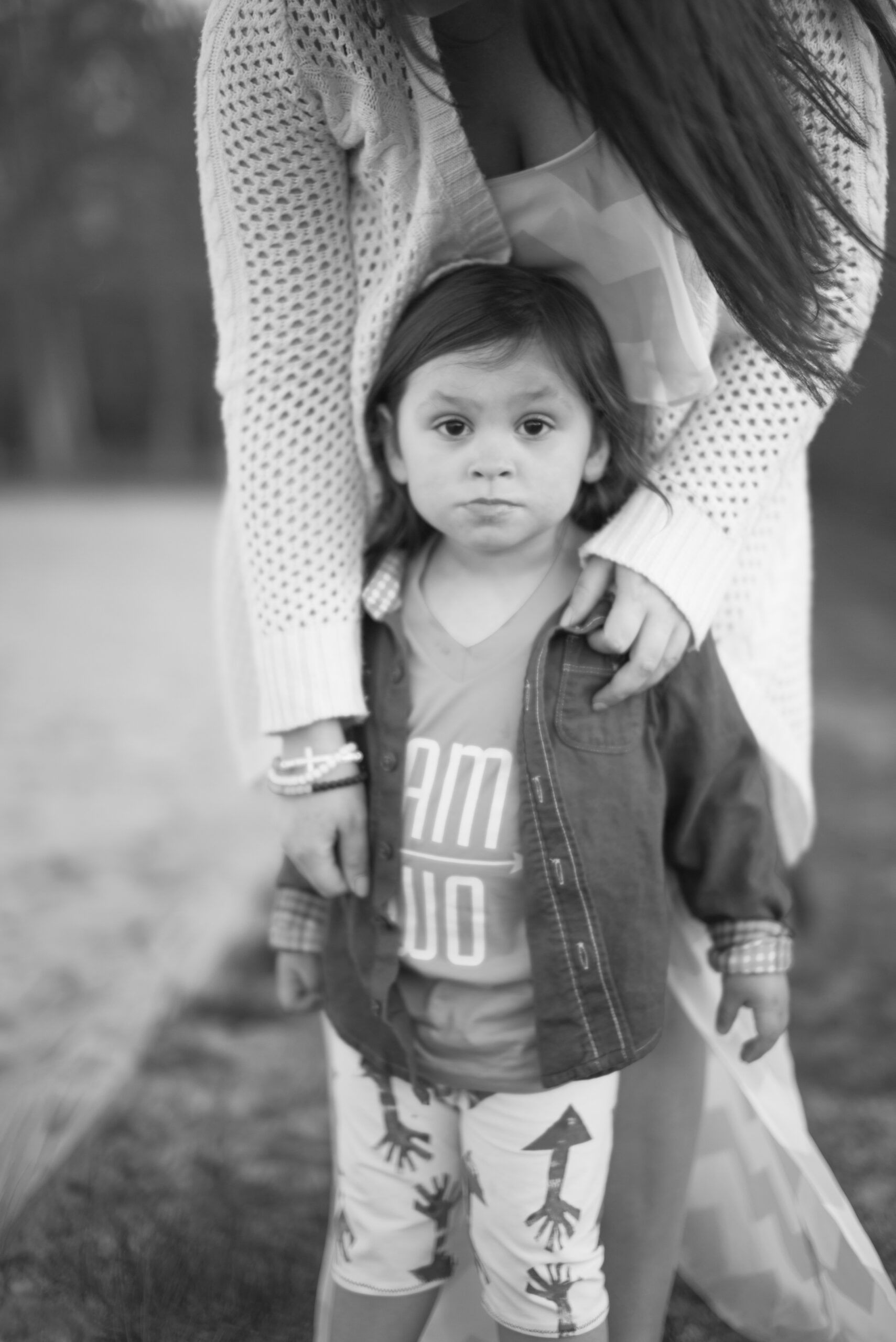 little boy and mom in family pictures for second birthday in traverse city michigan