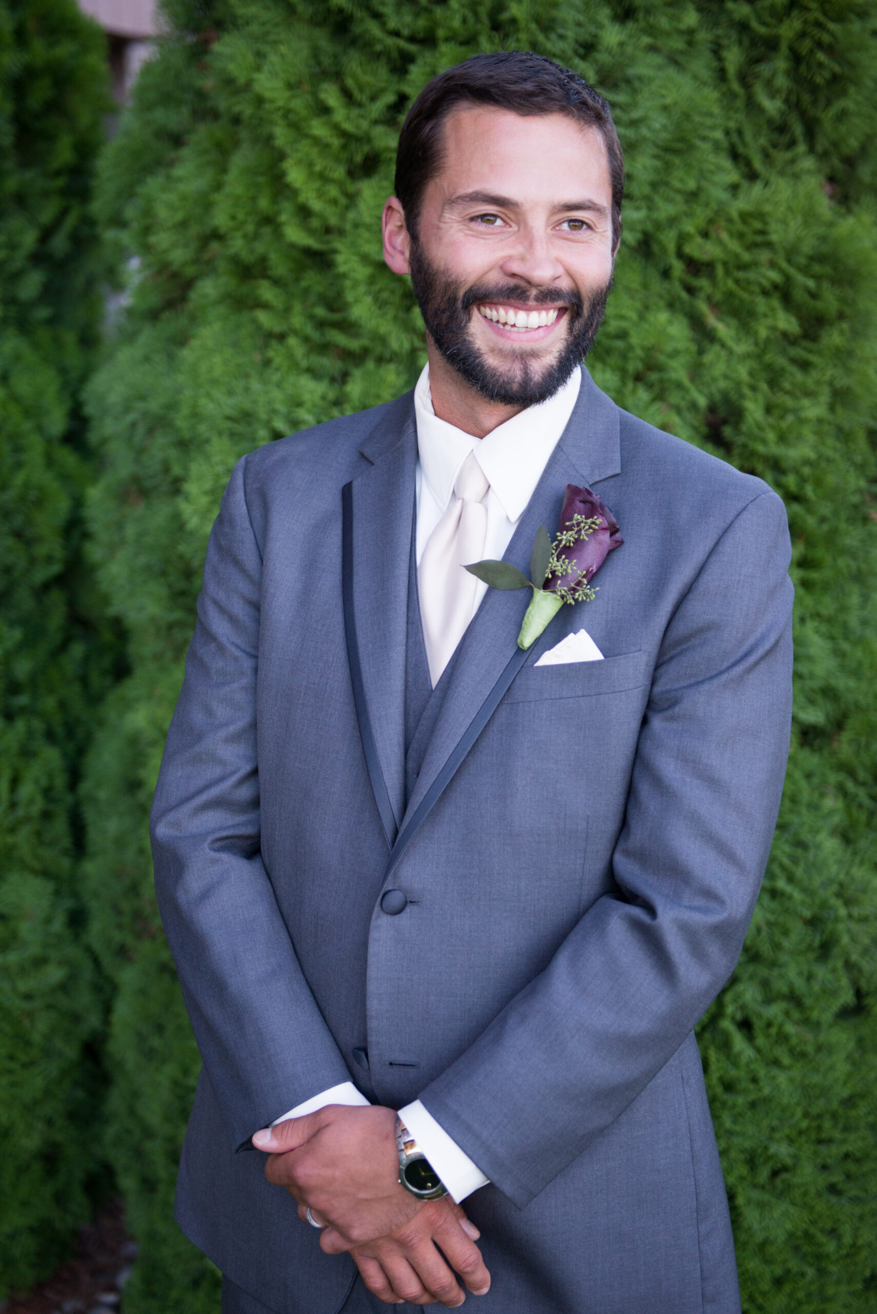 candid groom photography at wedding in traverse city michigan