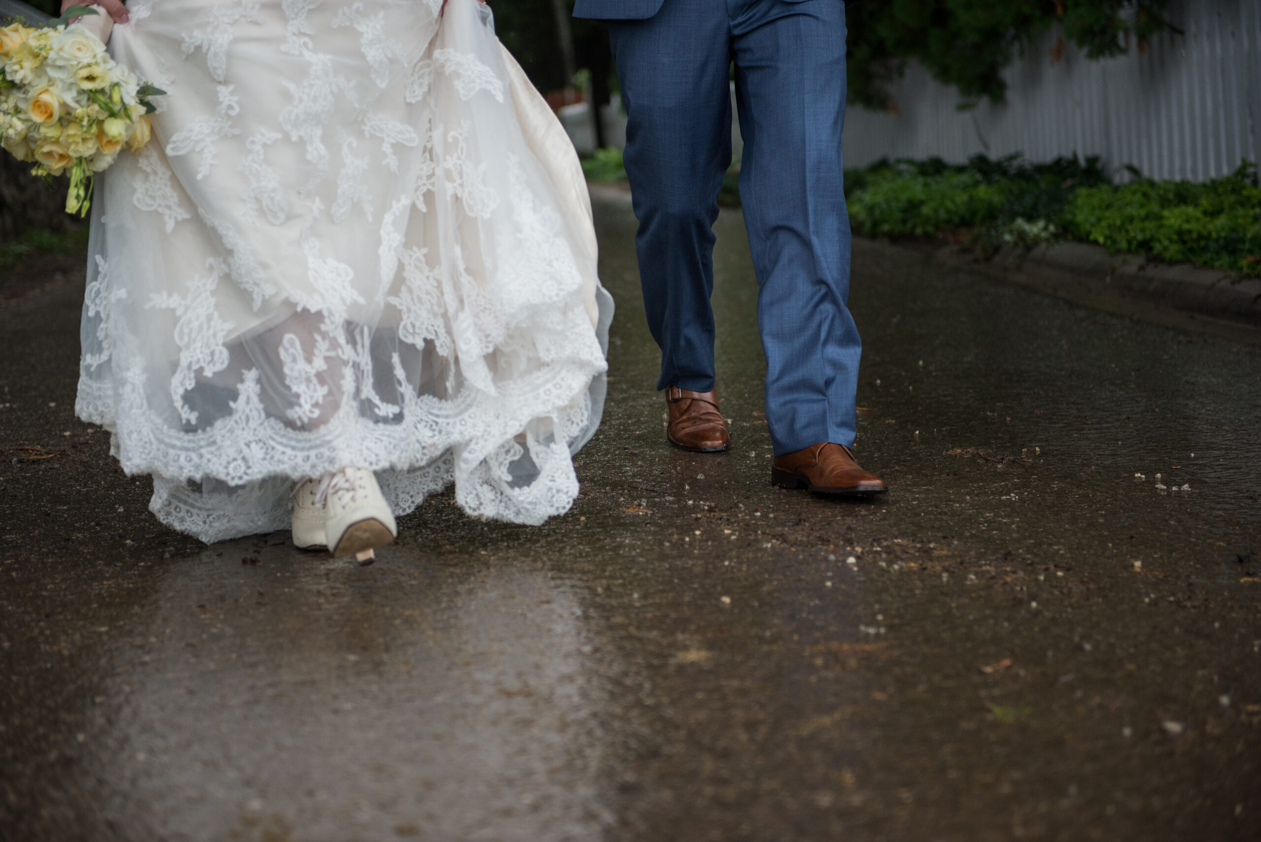 vintage style bride and groom walking around mackinac island michigan 