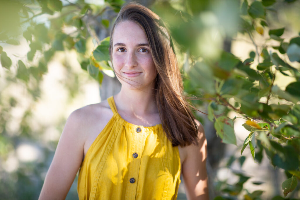 senior-girl-empire-beach-senior-photos-northern-michigan-photographer girl walking on beach during traverse city senior photos