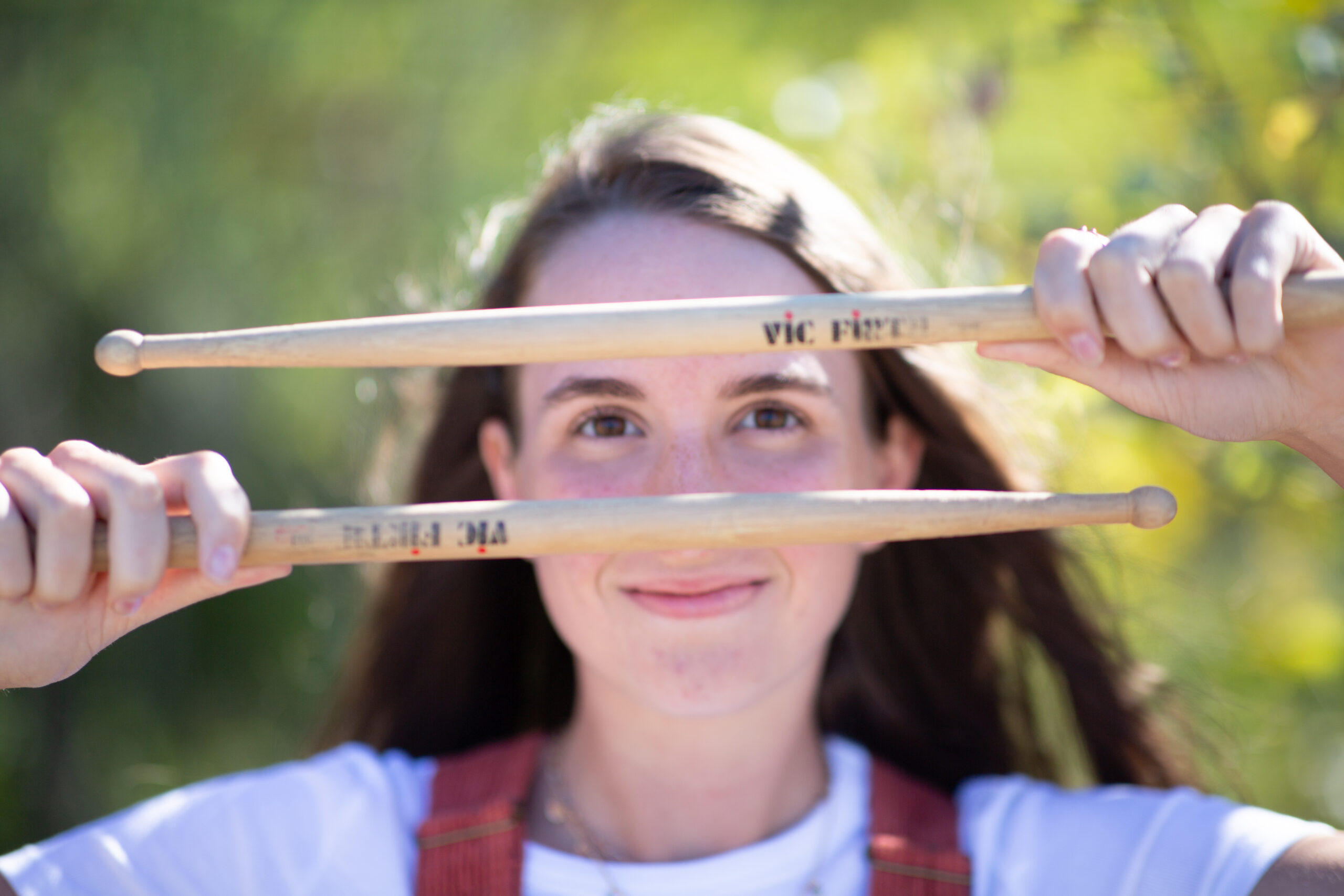 girl walking on beach during traverse city senior photos
