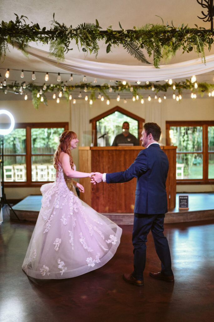 bride and groom at blue bridge event center in grawn michigan traverse city wedding photographer