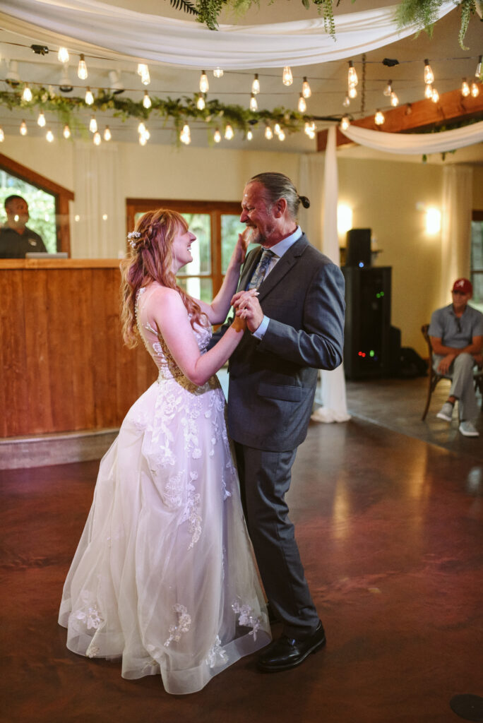 bride and dad at blue bridge event center in grawn michigan traverse city 