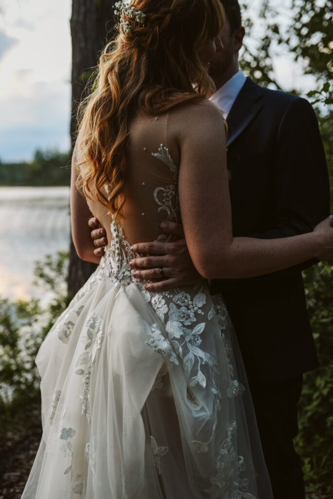 bride and groom at blue bridge event center in grawn michigan traverse city wedding photographer