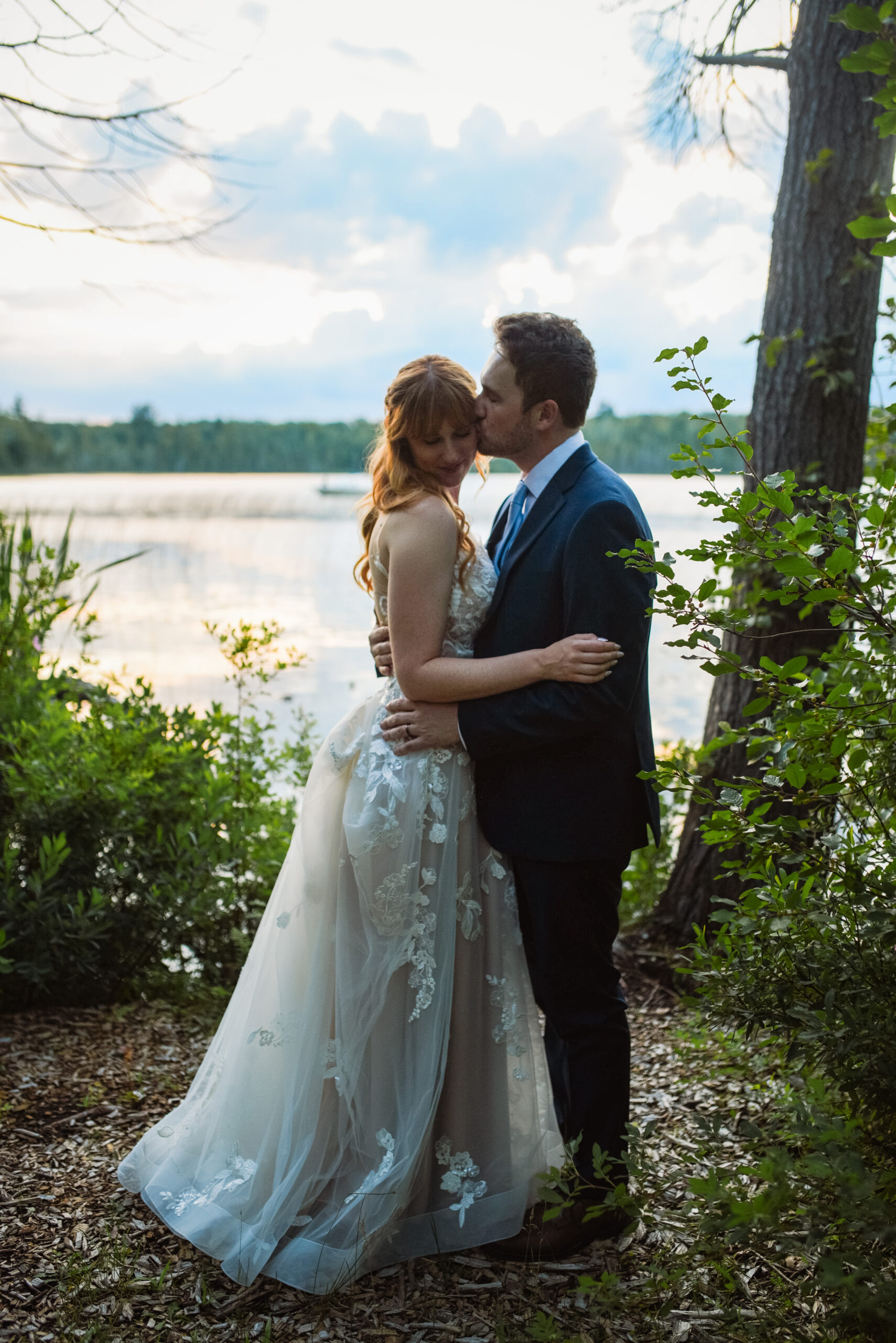 bride and groom at blue bridge event center in grawn michigan traverse city wedding photographer