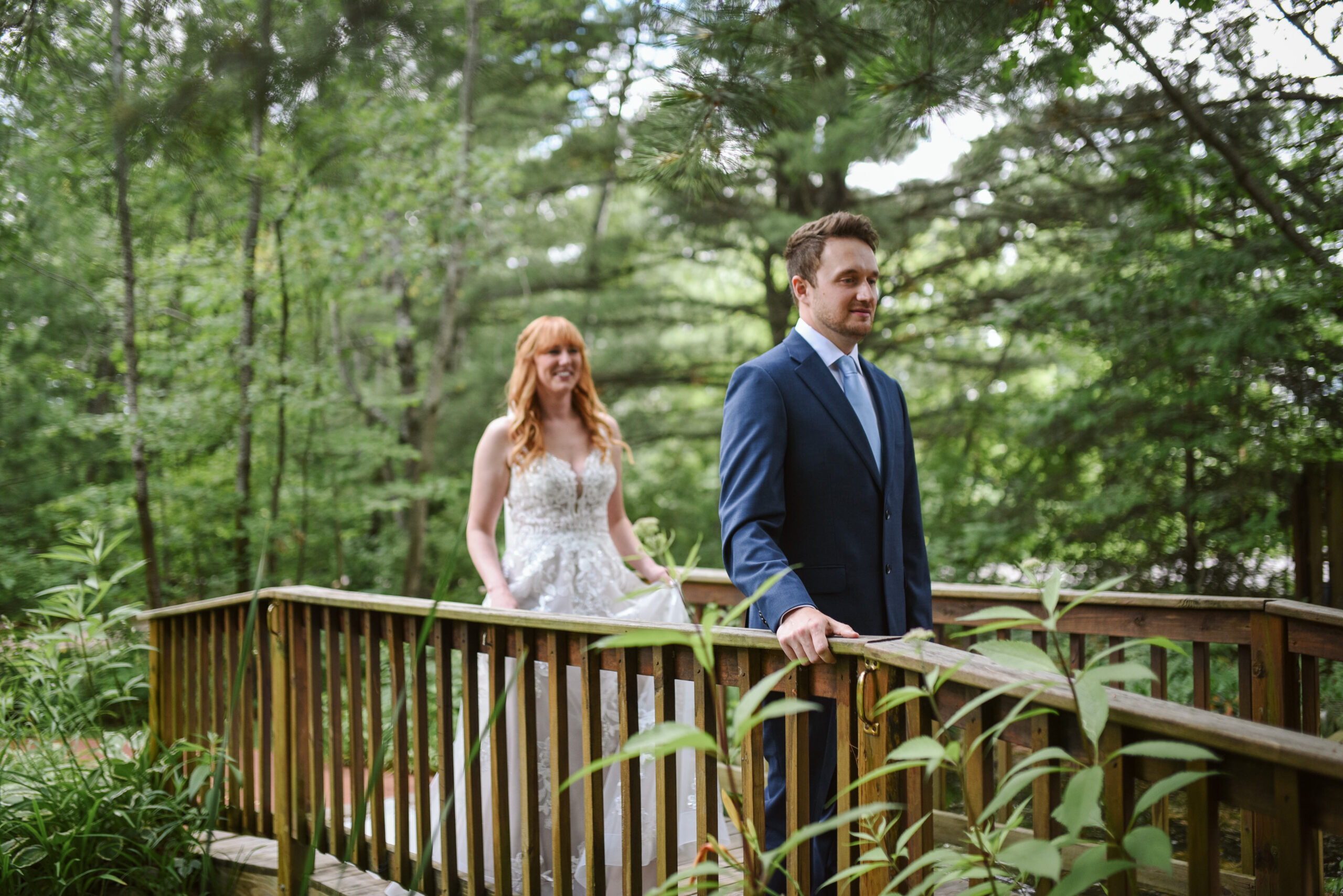 bride and groom at blue bridge event center in grawn michigan traverse city wedding photographer