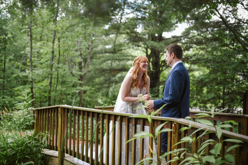 bride and groom at blue bridge event center in grawn michigan traverse city wedding photographer