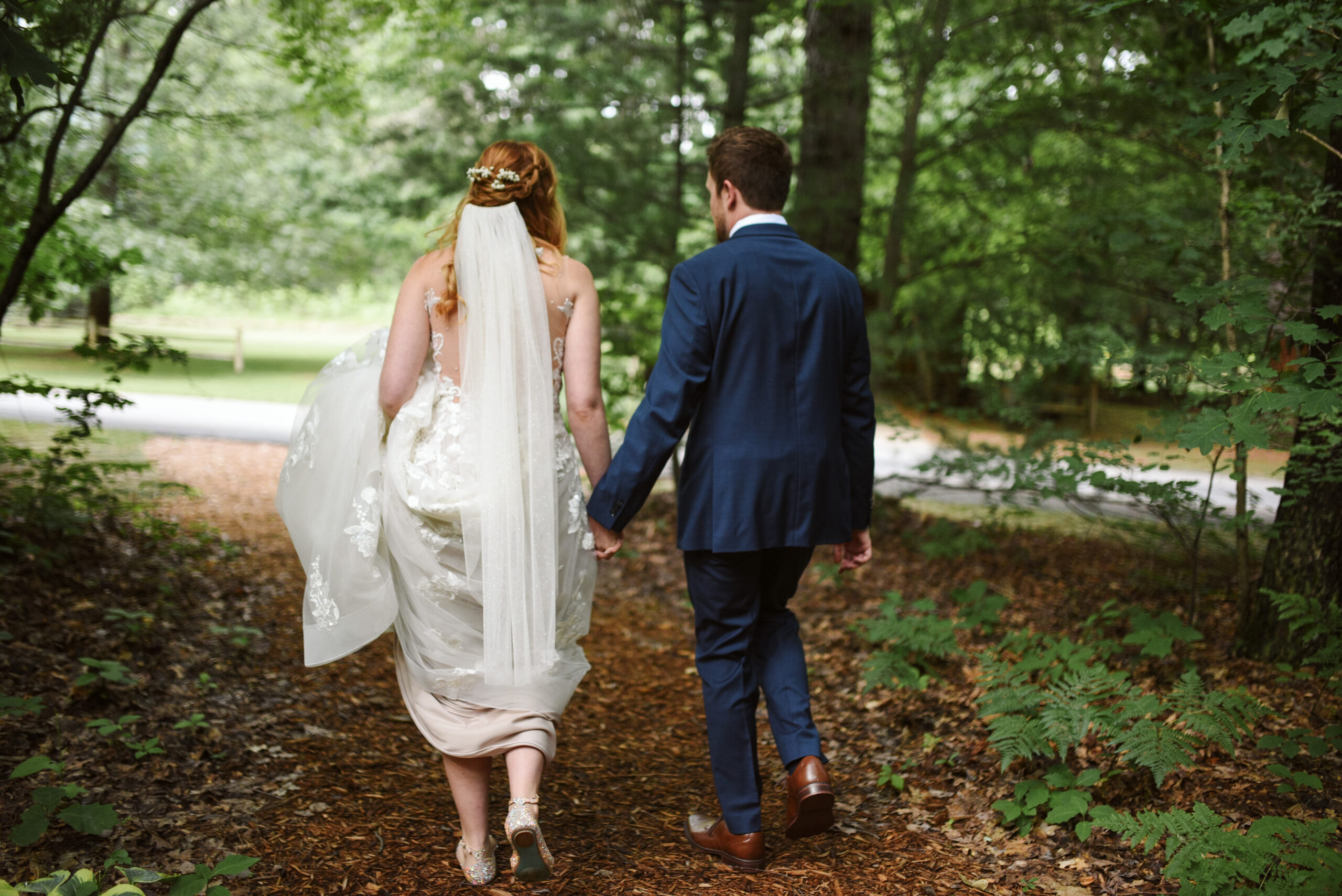 bride and groom at blue bridge event center in grawn michigan traverse city wedding photographer