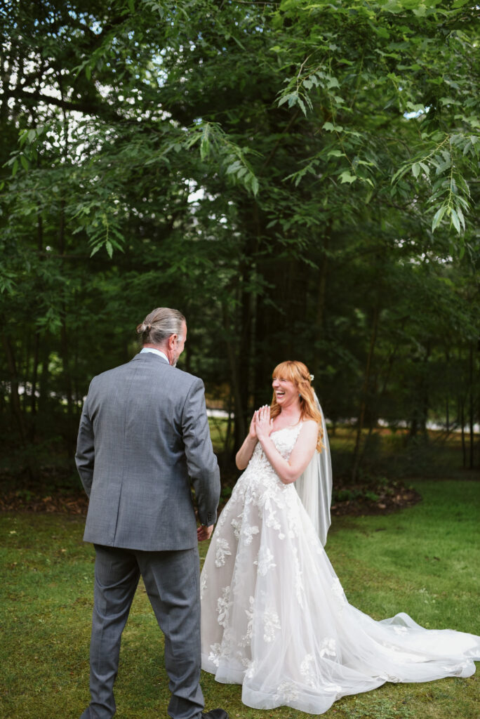 bride and father at blue bridge event center in grawn michigan traverse city wedding photographer