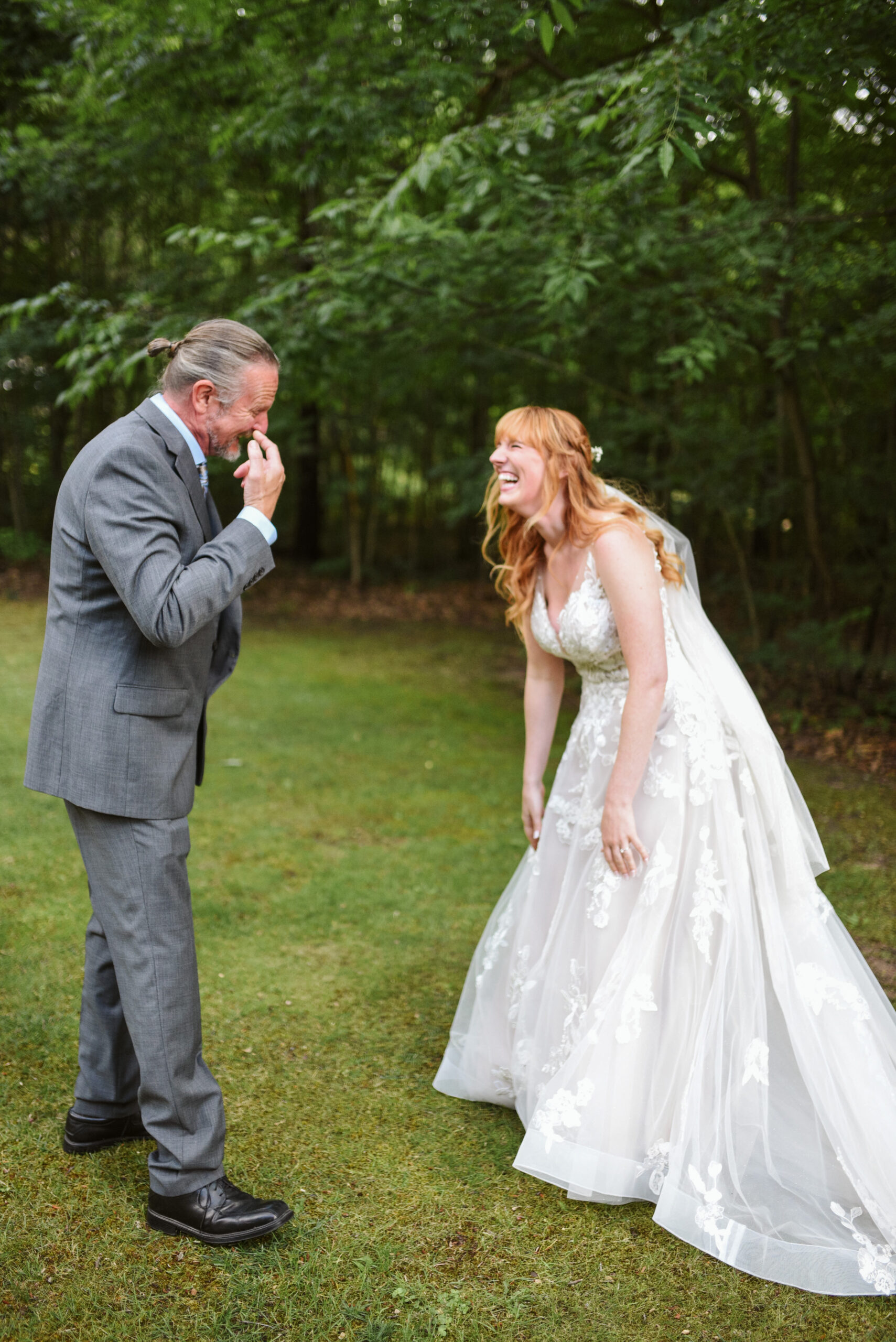 bride and father at blue bridge event center in grawn michigan traverse city wedding photographer