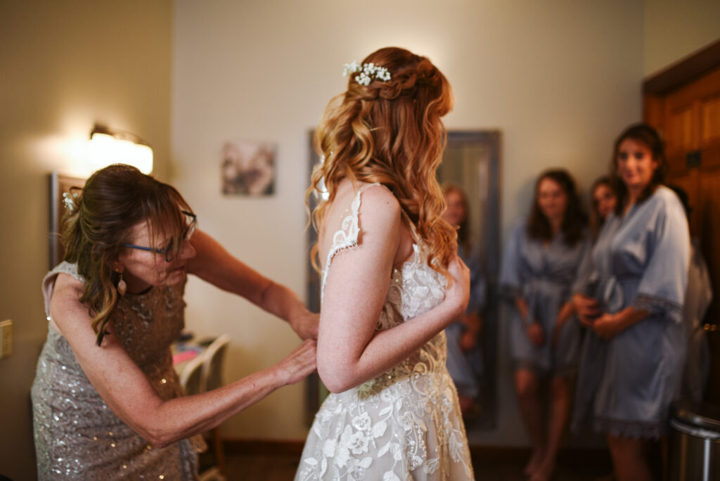 bride at blue bridge event center in grawn michigan traverse city wedding photographer