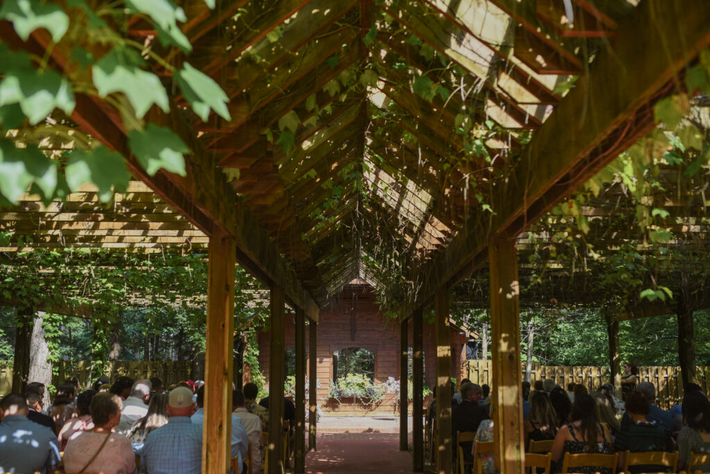 ceremony at blue bridge event center in grawn michigan traverse city wedding photographer