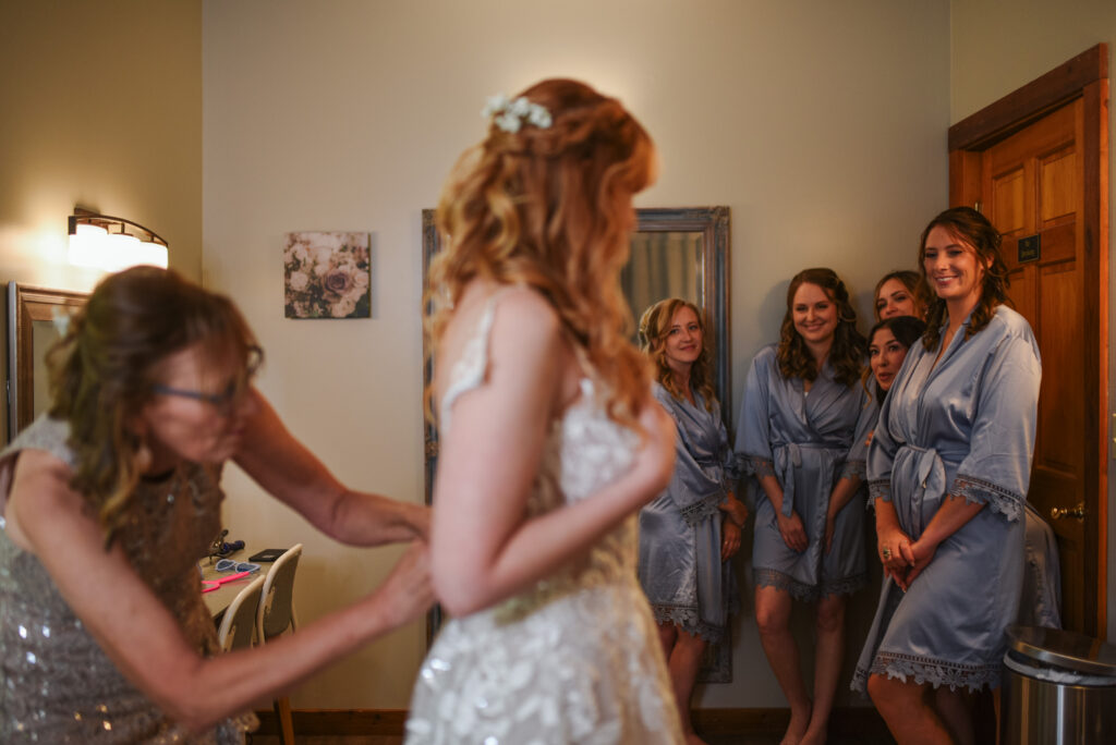 bride at blue bridge event center in grawn michigan traverse city wedding photographer