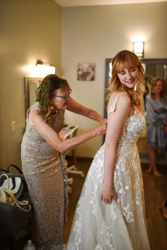 bride at blue bridge event center in grawn michigan traverse city wedding photographer