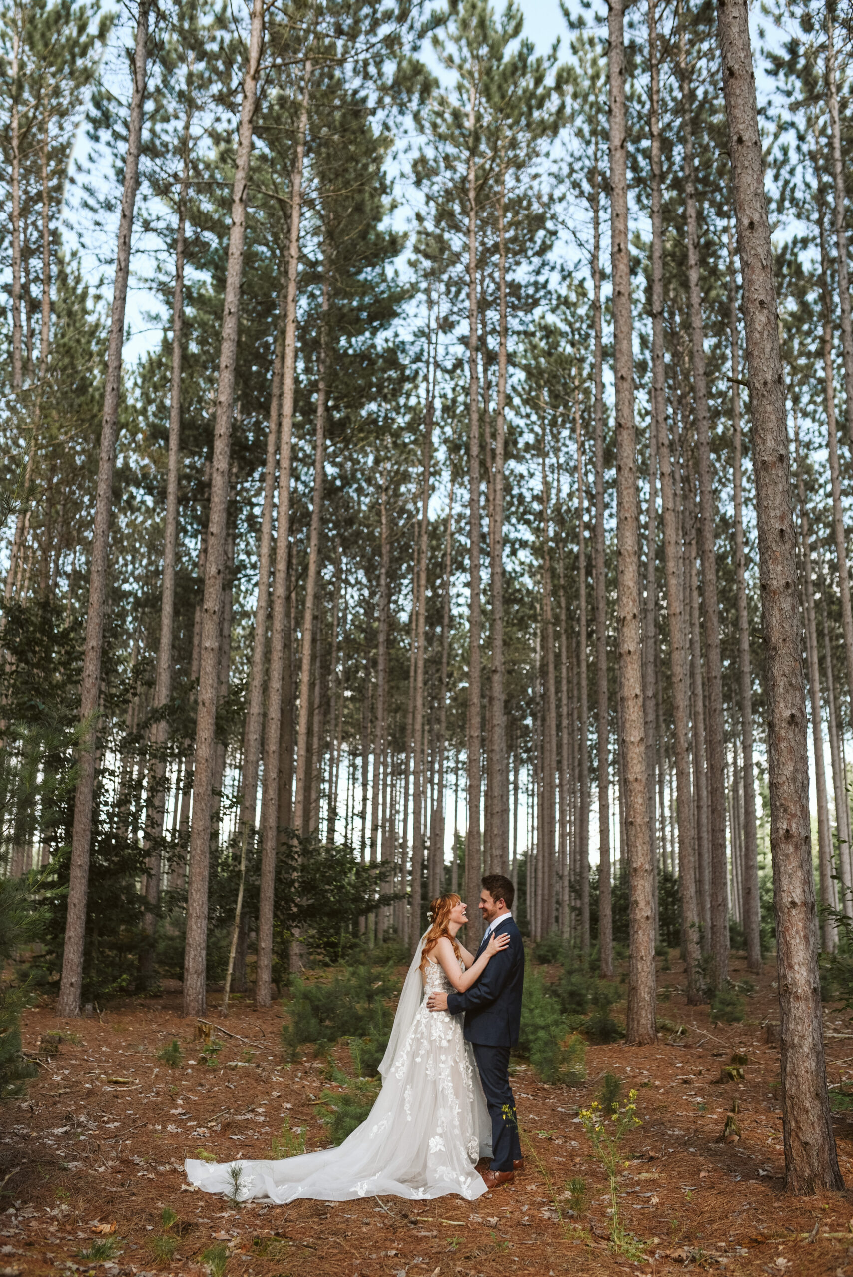 bride and groom at blue bridge event center in grawn michigan traverse city wedding photographer