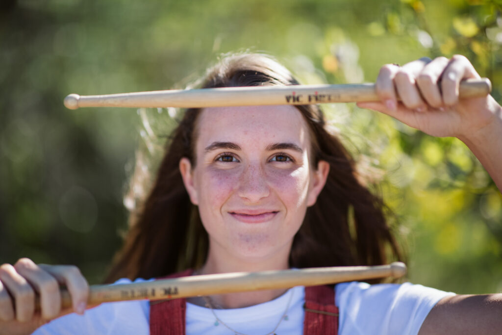 girl on empire beach taking senior pictures in empire michigan traverse city photographer