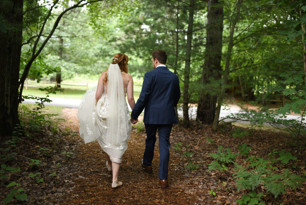 bride and groom at blue bridge event center wedding in traverse city michigan Northern Michigan Wedding Photography