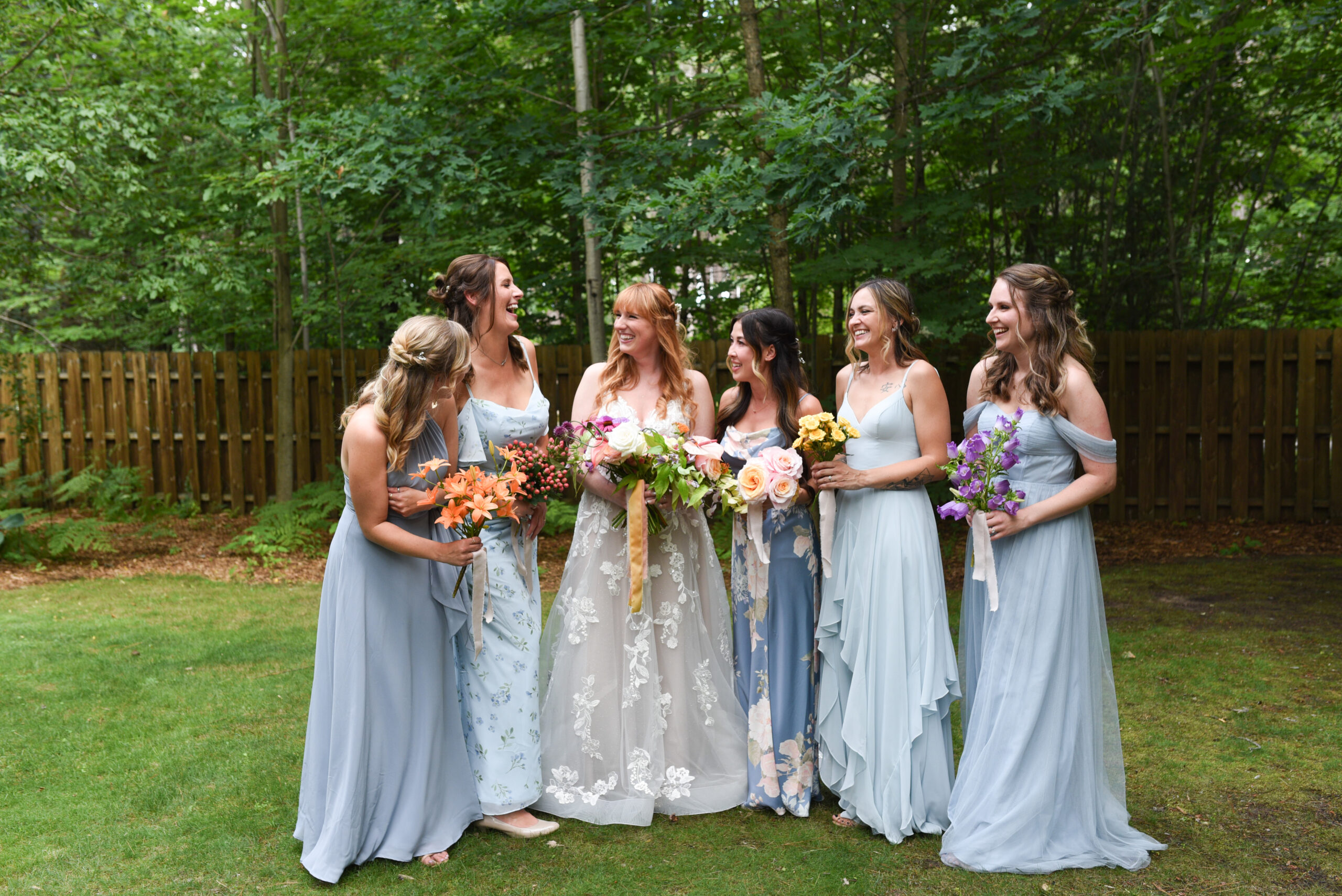 bride and brides maids at blue bridge event center wedding in traverse city michigan wedding photography