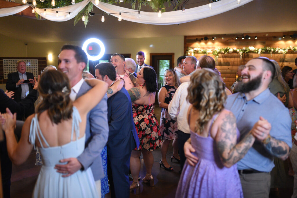 wedding reception dancing at blue bridge at wedding in traverse city michigan wedding photography
