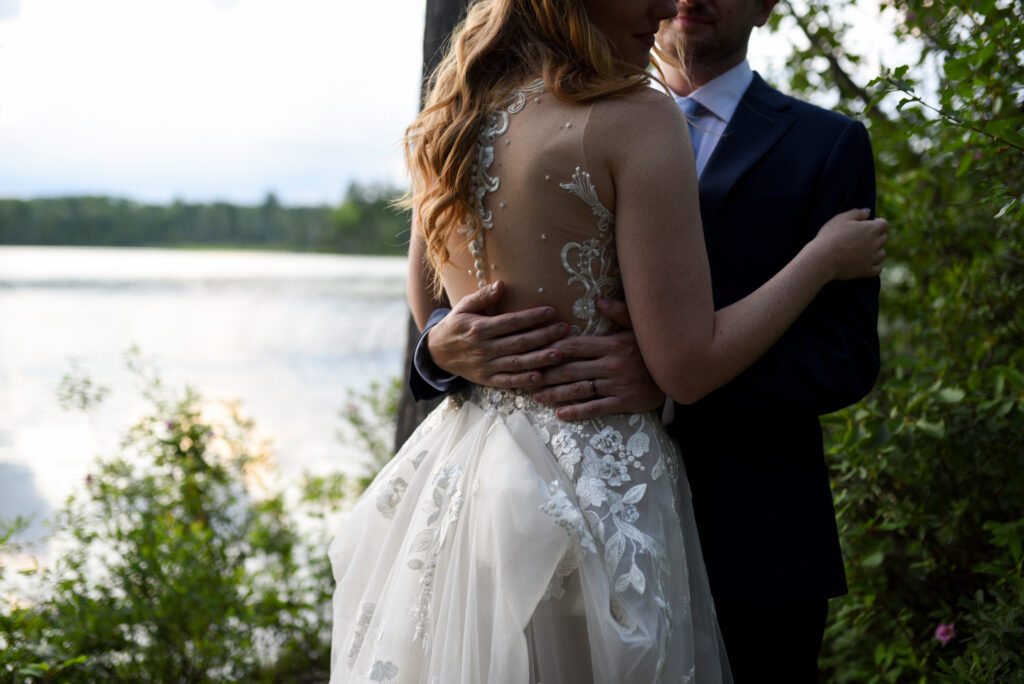 bride and groom at sunset at blue bridge event center wedding in traverse city michigan wedding photography