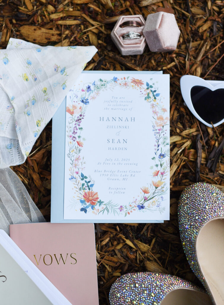 wedding details lay flat at blue bridge event center wedding in traverse city michigan wedding Northern Michigan Wedding Photography