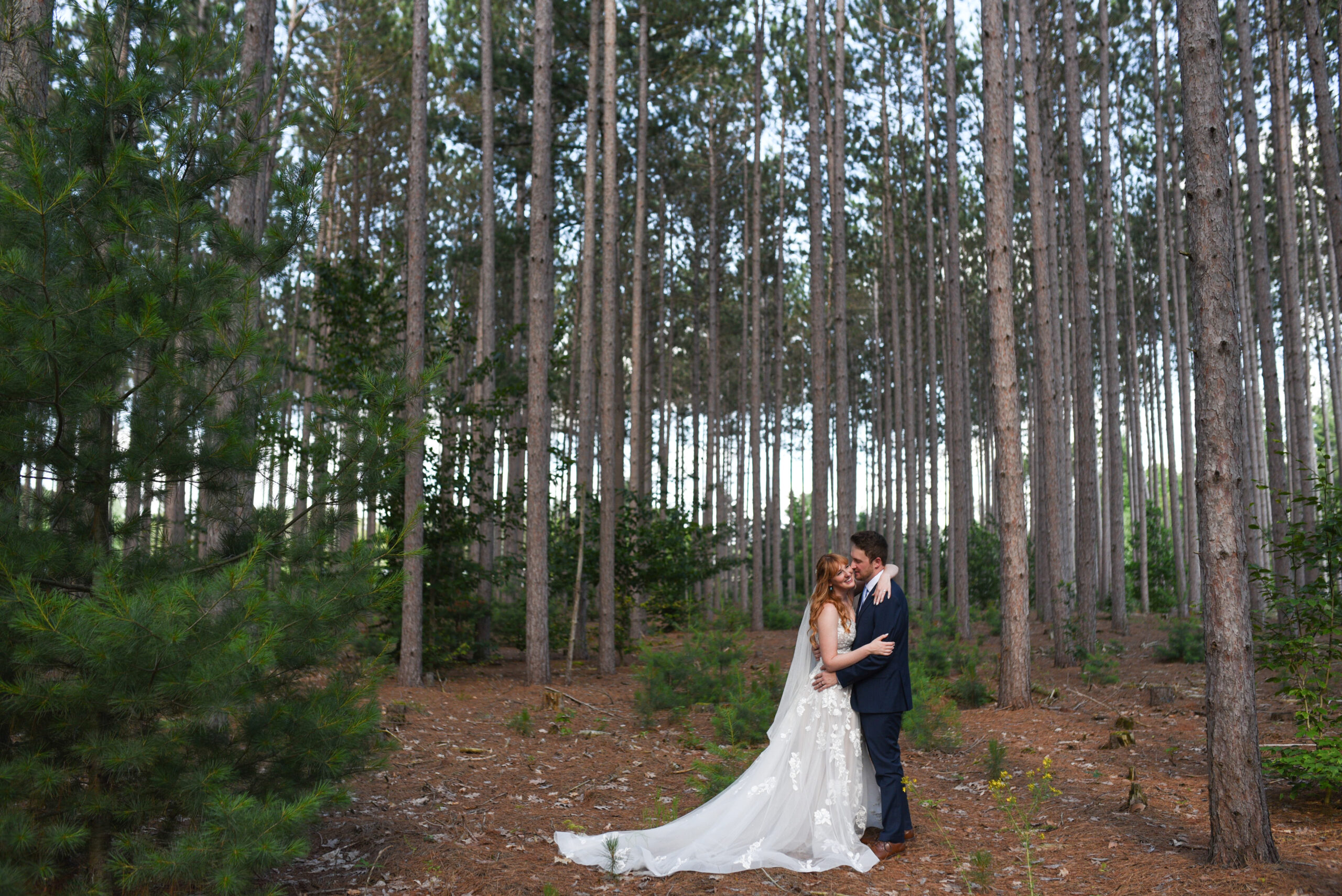 bride and groom at blue bridge event center wedding in traverse city michigan wedding photography