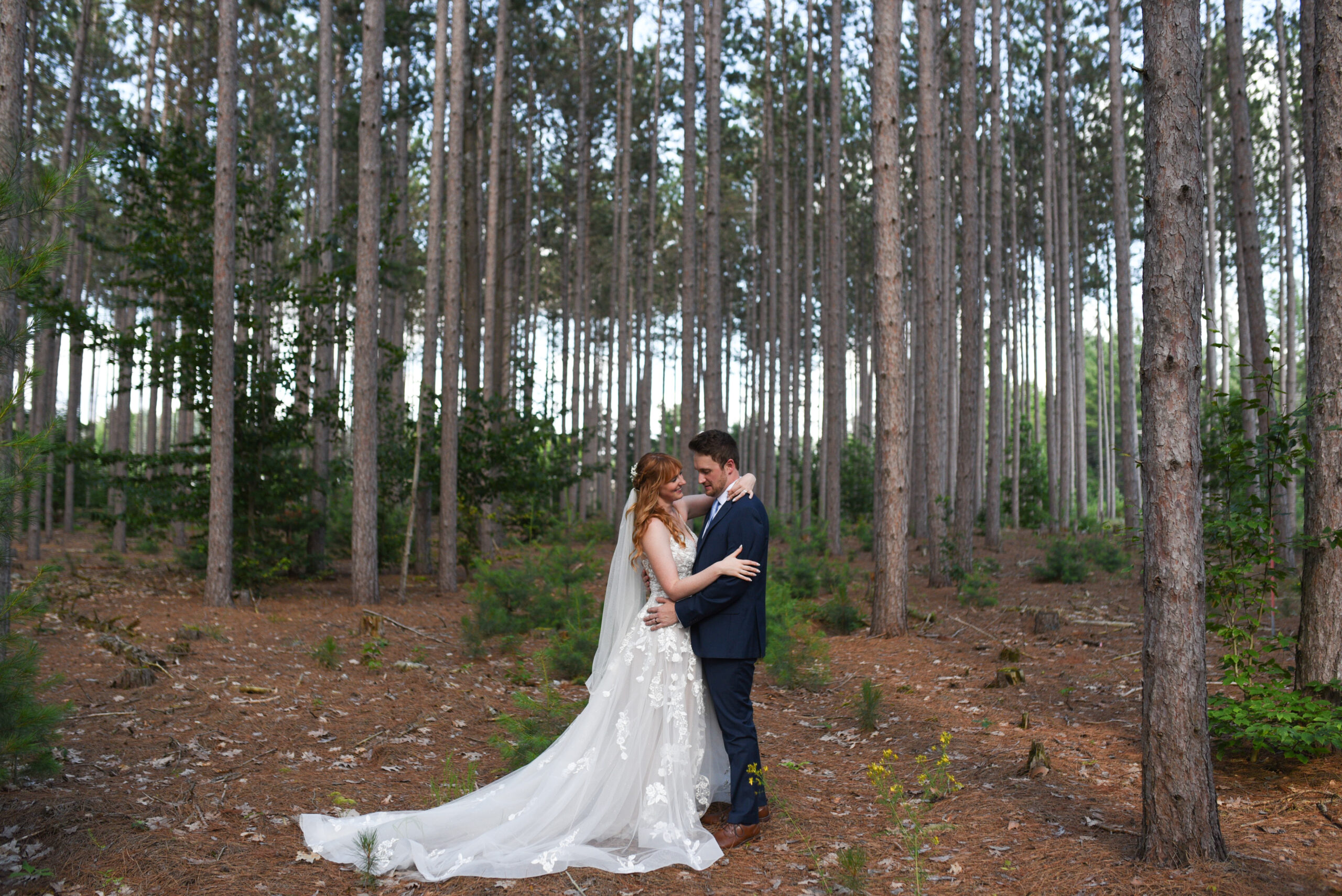 bride and groom at blue bridge event center wedding in traverse city michigan wedding photography