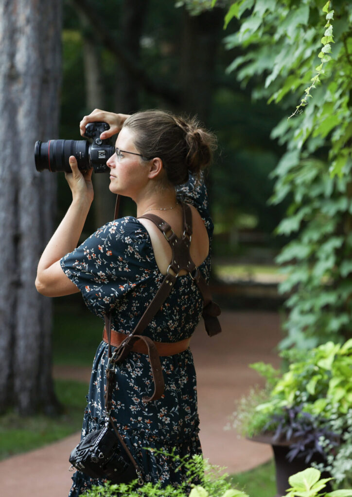 blue-bridge-event-center-Traverse-city-michigan-wedding-photographer lina lavonne robertson photographer with canon r6 photographing traverse city wedding