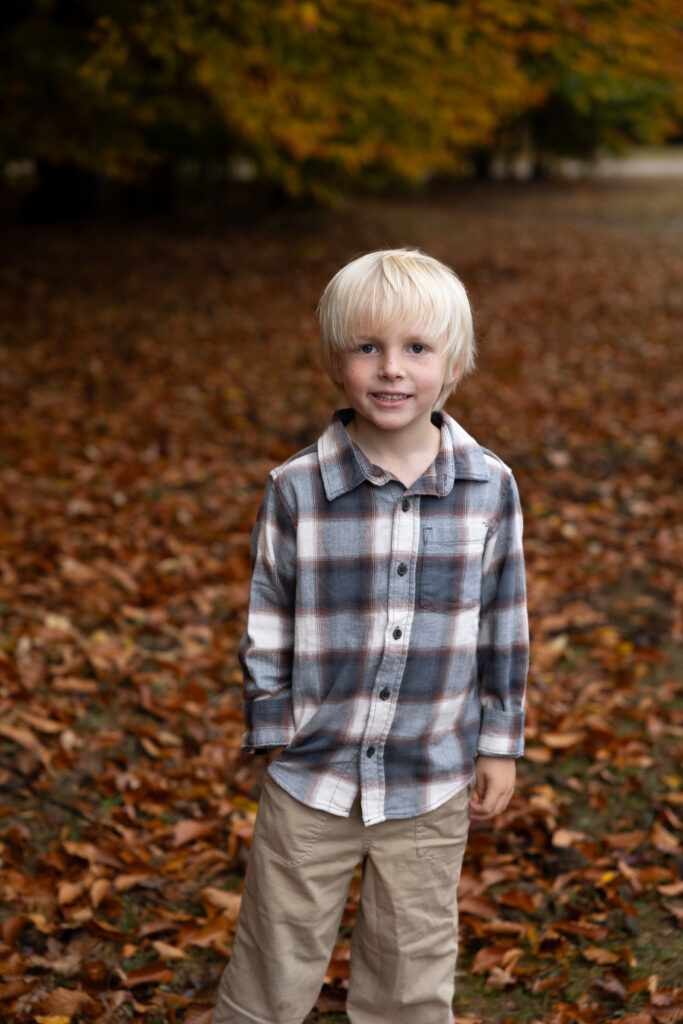 Little boy in family portraits in empire michigan family photographer