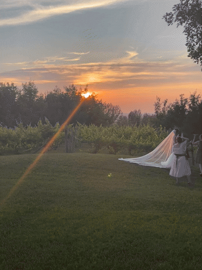 Traverse City Wedding Photographer Lina Lavonne Photography taking pictures at wedding