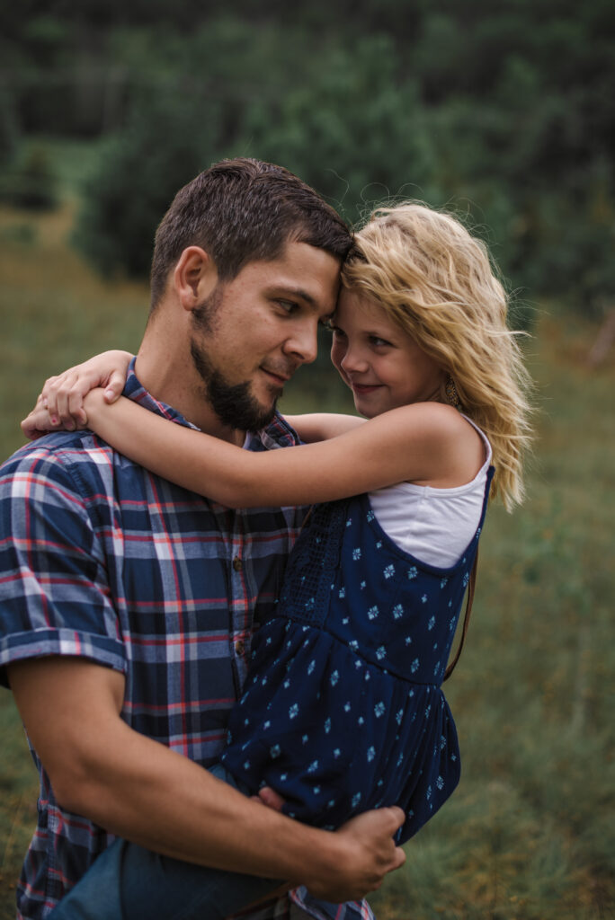 father and daughter in family pictures in traverse city photographer
