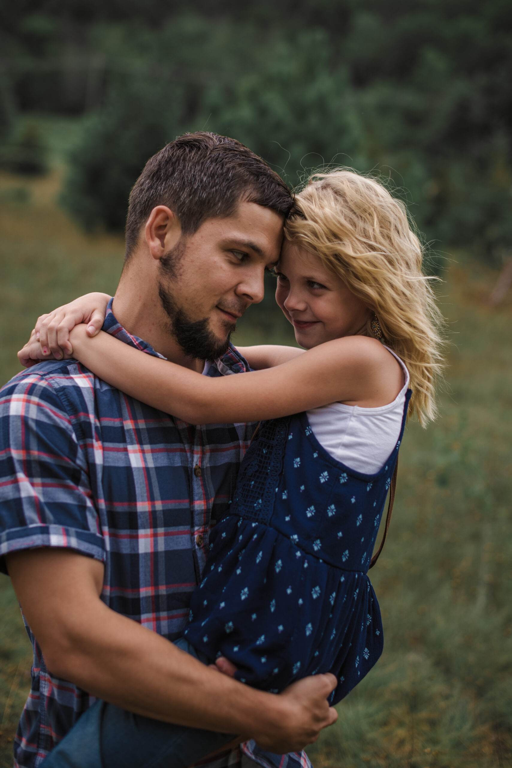 father and daughter in family pictures in traverse city photographer