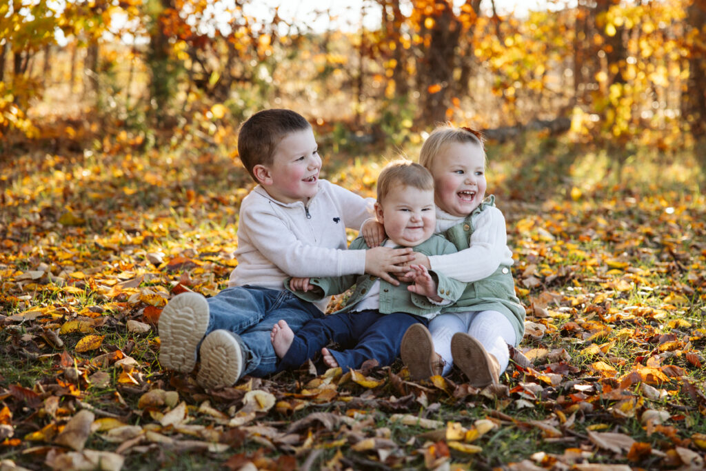 little kids in fall family pictures in empire michigan traverse city photographer