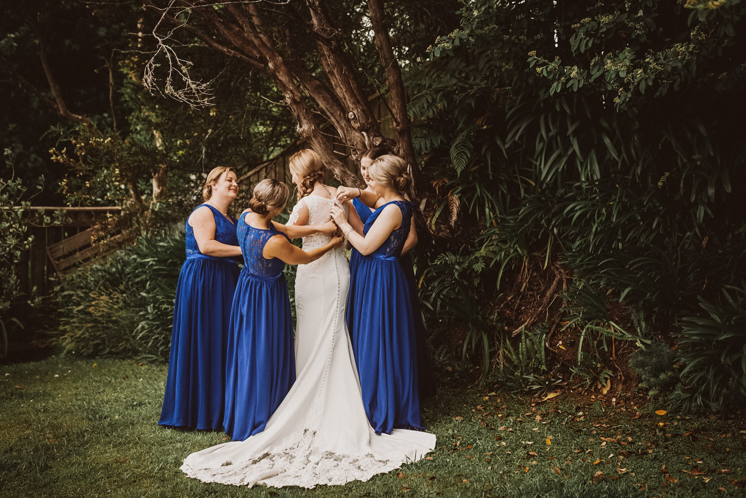 traverse-city-wedding-photography bride and bridesmaids at wedding traverse city wedding photographer