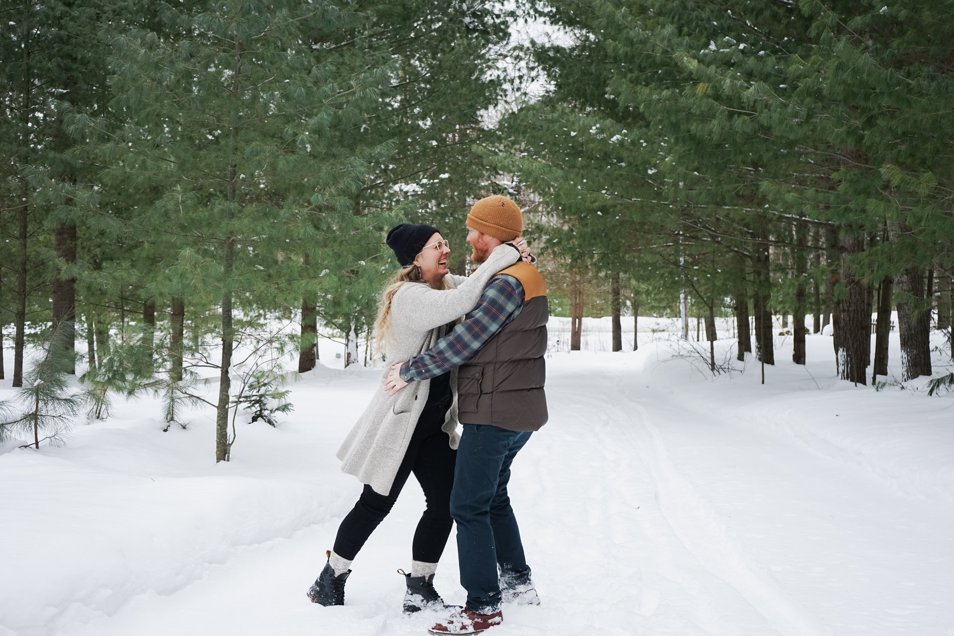 winter engagement photos in northern michigan