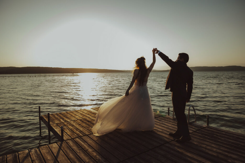 glen arbor michigan bride and groom at wedding dancing on dock