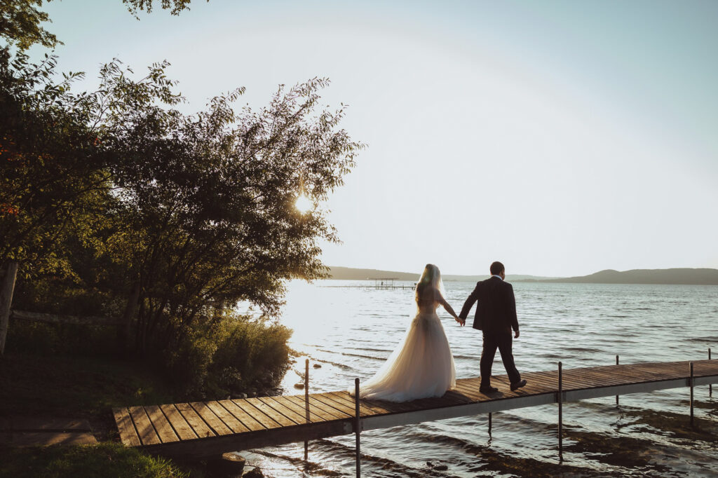 bride and groom during sunset in glen arbor michigan wedding photographer