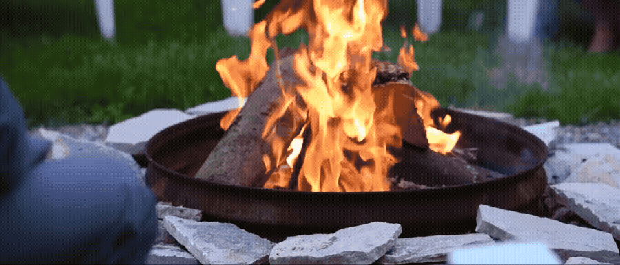 guests at wedding cheering together at aurora cellars. Video by traverse city wedding videographer