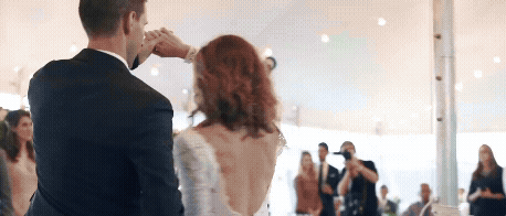 bride and groom dancing during their first dance at wedding at aurora cellars. Wedding video by Traverse City Videographer