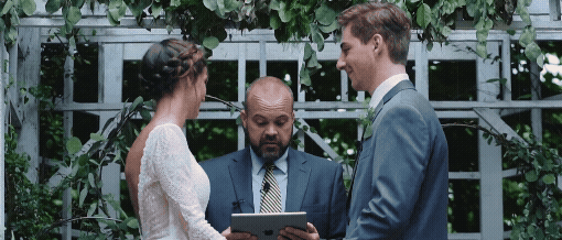 bride and grooms first kiss at their ceremony at mill creek wilde