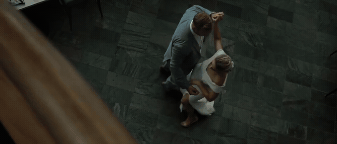 top view of a couple dancing in the grand traverse resort during their wedding in traverse city. Video by Traverse city wedding videographer