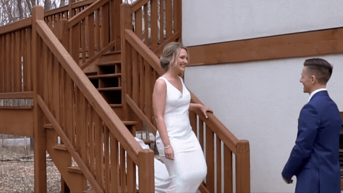 Bride and groom during first look at boyne mountain 