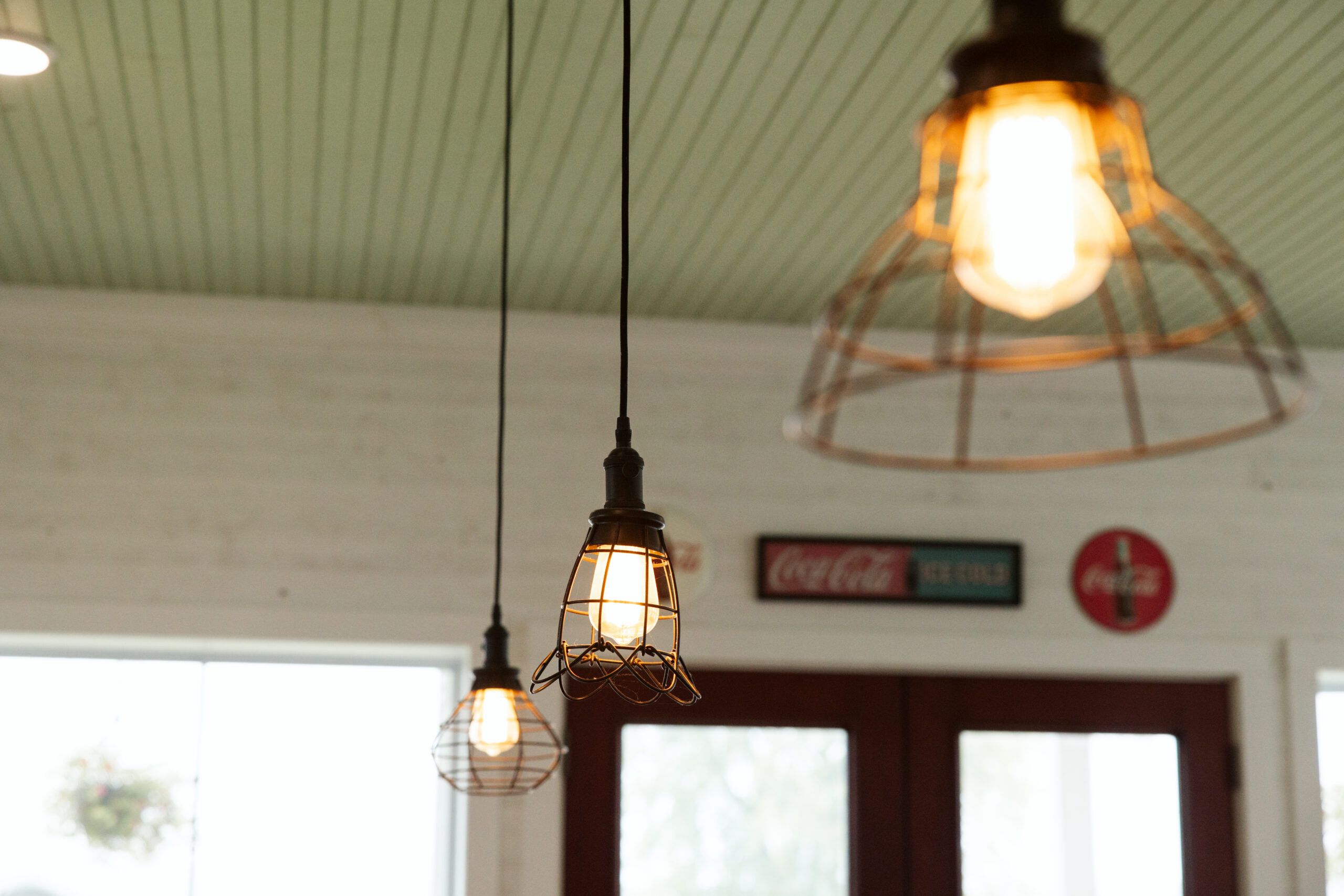 lights hanging at general store airbnb at a general store at wedding in east jordan boathouse on lake charlevoix