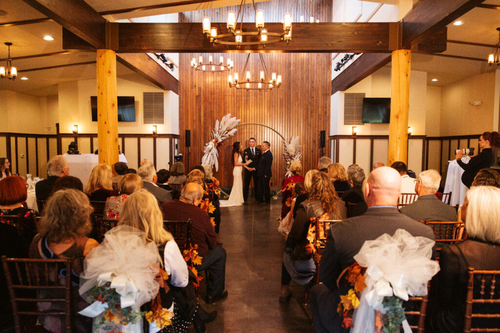 wide photo of peninsula cellars wedding ceremony