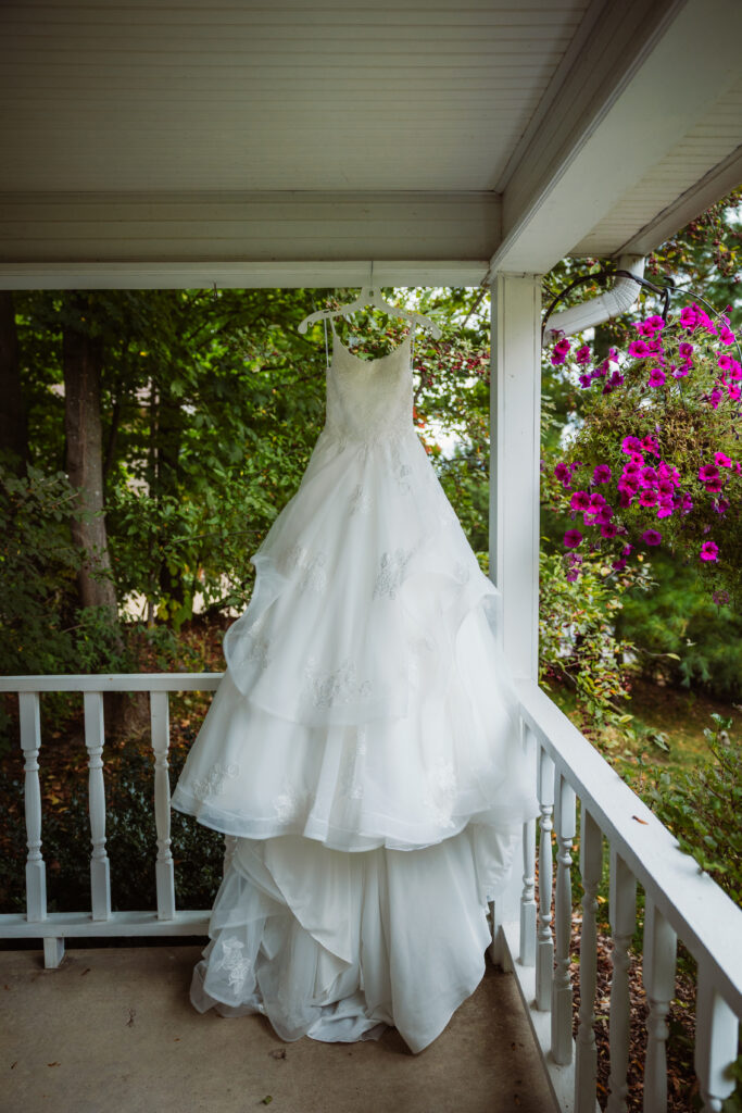 bridal gown hanging on front porch in traverse city